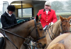 A gentleman with a red jacket
